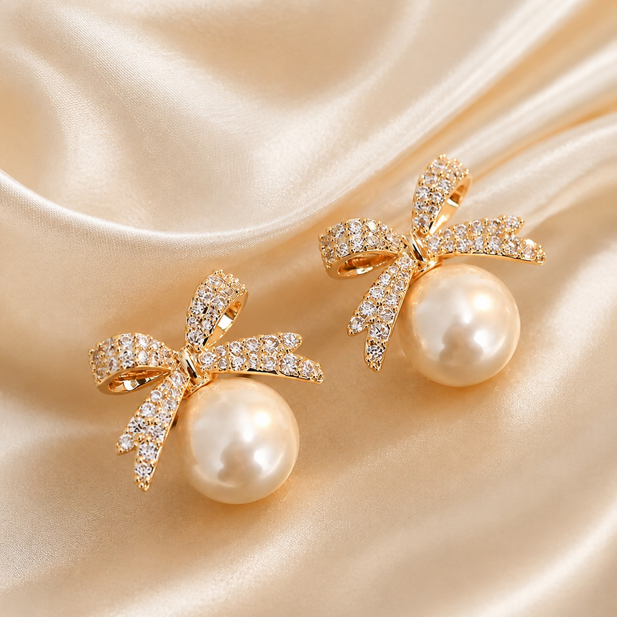 Pavé Crystal Ribbon Bow Stud Earrings with Pearl Drops